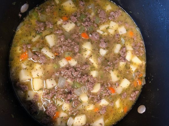 cheeseburger soup cooking in pot