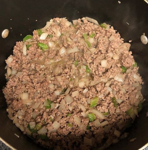 cooked ground beef, onion, bell pepper, and garlic in pot