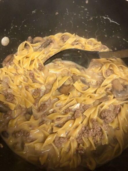easy one-pot beef stroganoff in pan with spoon
